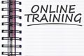 Online training words on spring note book Royalty Free Stock Photo