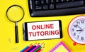 Online tutoring. The inscription of text on the screen of the smartphone.