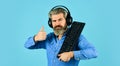 Online Video Game. Cyber Championship. agile business. downloading music from internet. bearded man headphones and