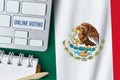 Online voting concept in United Mexican States. Keyboard near country Mexico flag