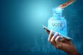 Online voting, Hand with a hologram ballot and a box for Internet voting in a mobile phone on a blue background. Mixed environment