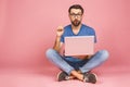 Online working concept. Casual business man relaxed working and browsing internet on laptop computer. Freelance sitting and typing Royalty Free Stock Photo