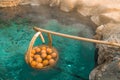 Onsen Hot Spring Eggs in National Park Chae Son, Lampang Thailand, traditional method of boiling eggs in the natural hot springs