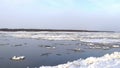 The onset of winter, the first ice floes float on the river.