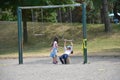 Children play on a closed Toronto public playground during the Covid-19 Pandemic.