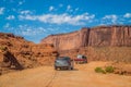 ÃÅonument Valley Navajo Tribal Park. Travelling through the desert by off off road car Royalty Free Stock Photo
