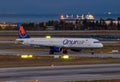 Onur Air Airbus A321 at night Royalty Free Stock Photo