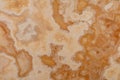 Onyx Miele background, natural texture in warm color, slab photo. Extra soft beige, brown material texture. Glossy