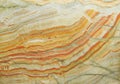 Onyx texture background of natural stone with polished orange streaks. marble texture used for indoor and outdoor home decoration