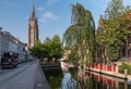 Onze Lieve Vrouw cathedral tower along Dijver, Bruges, Belgium Royalty Free Stock Photo