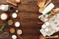 Ood flat lay on kitchen table background. Butter, milk, yeast, flour, eggs Royalty Free Stock Photo