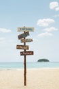 Ooden signpost on summer tropic beach