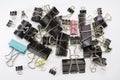 Oodles of metal binder clips for paper. different sizes Royalty Free Stock Photo