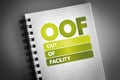 OOF - Out Of Facility acronym on notepad, business concept background