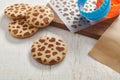 ÃÂ¡ookies with a pattern in the form of hearts, cookie cutters, stencil, cutting board and baking mat on a white wooden surface Royalty Free Stock Photo