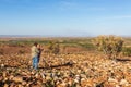 Oombulgurri WA Australia - Sep 2 2014: An Australian indigenous community leader explain landscape features to adventure