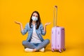 Oops. Full body photo of pretty young lady sitting floor unhappy missed flight rolling bag travel airport quarantine Royalty Free Stock Photo