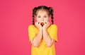 Oops. Portrait Of Shocked Little Girl Touching Face And Looking At Camera Royalty Free Stock Photo