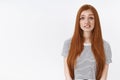 Oops sorry. Redhead girl did not ment accidently broke vase look awkward smiling feel guilt apologizing standing intense Royalty Free Stock Photo