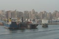 Moored general cargo vessels during loading in port of Alexandria.