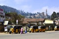 Parked yellow three wheelers called tuk tuk