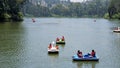 Boating in ooty lake. Artificial lake in the Nilgiris district of Tamil Nadu, India. Major scenic tourist attraction with Paddle, Royalty Free Stock Photo