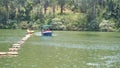 Boating in ooty lake. Artificial lake in the Nilgiris district of Tamil Nadu, India. Major scenic tourist attraction with Paddle, Royalty Free Stock Photo