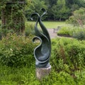 Opal stone sculpture titled Emerging by Temali Y in the Fort Worth Botanic Garden. Royalty Free Stock Photo