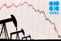 OPEC logo and silhouette industrial oil pump jack with devaluation graph