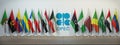 OPEC. Symbol and flags of OPEC countries.