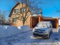 Opel Combo Life passenger van covered with snow in the courtyard Royalty Free Stock Photo