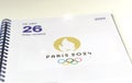 An open agenda on the page of July 26, 2024, opening day of the Paris 2024 Summer Olympics. Official Paris 2024 logo. Royalty Free Stock Photo