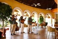 Open-air cafe with musicians, playing instruments at the resort. Cuba, Varadero