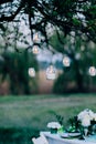 Open air decorated area for the wedding ceremony with flowers and candles