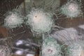 Shot car, broken armored glass of the car. Open-air museum of the famous drug dealer Pablo Escobar in Colombia.