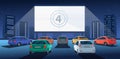 Open air parking. Car cinema with white screen and counting down the numbers to the start of the movie. Drive-in cinema theater at Royalty Free Stock Photo