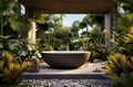 Open air stone bathtub. Beautiful view of outside bathroom on veranda with beautiful tropical garden view in luxury Royalty Free Stock Photo