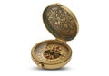 Open antique brass compass with a decorative, engraved lid Royalty Free Stock Photo
