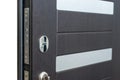 Open armored door. Door lock, Dark brown door closeup. Modern interior design, door handle. New house concept. Real estate.