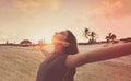 Open arms girl at sunset caribbean beach Royalty Free Stock Photo