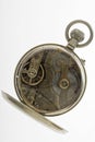 Open back side showing watch mechanism of vintage pocket watch inside