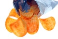 Open bag of potato chips on white background Royalty Free Stock Photo