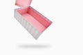 open beautiful pink paper box on white background