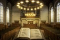 Open Bible book placed in the center of a wooden pew-filled church Royalty Free Stock Photo