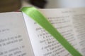 Open Book of Psalms, green bound bookmark over the page Royalty Free Stock Photo