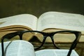 Open Bible with Glasses Royalty Free Stock Photo