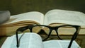 Open Bible with Glasses Royalty Free Stock Photo