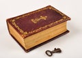 Open Bible with key Royalty Free Stock Photo