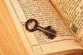 Open Bible with key Royalty Free Stock Photo