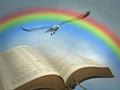 Open bible peace rainbow bird holy scripture heaven word of god Royalty Free Stock Photo